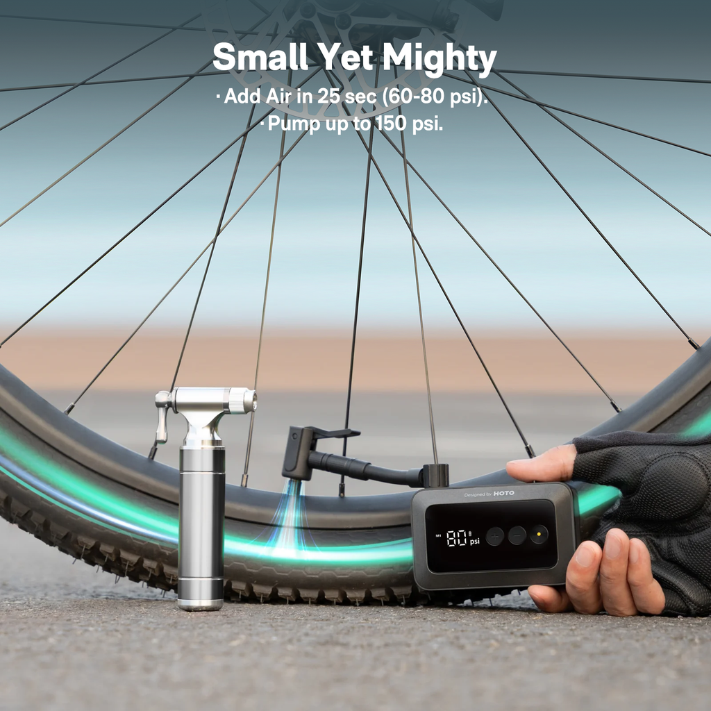 HOTO Air Pump Pocket inflating a bicycle tire beside a floor pump